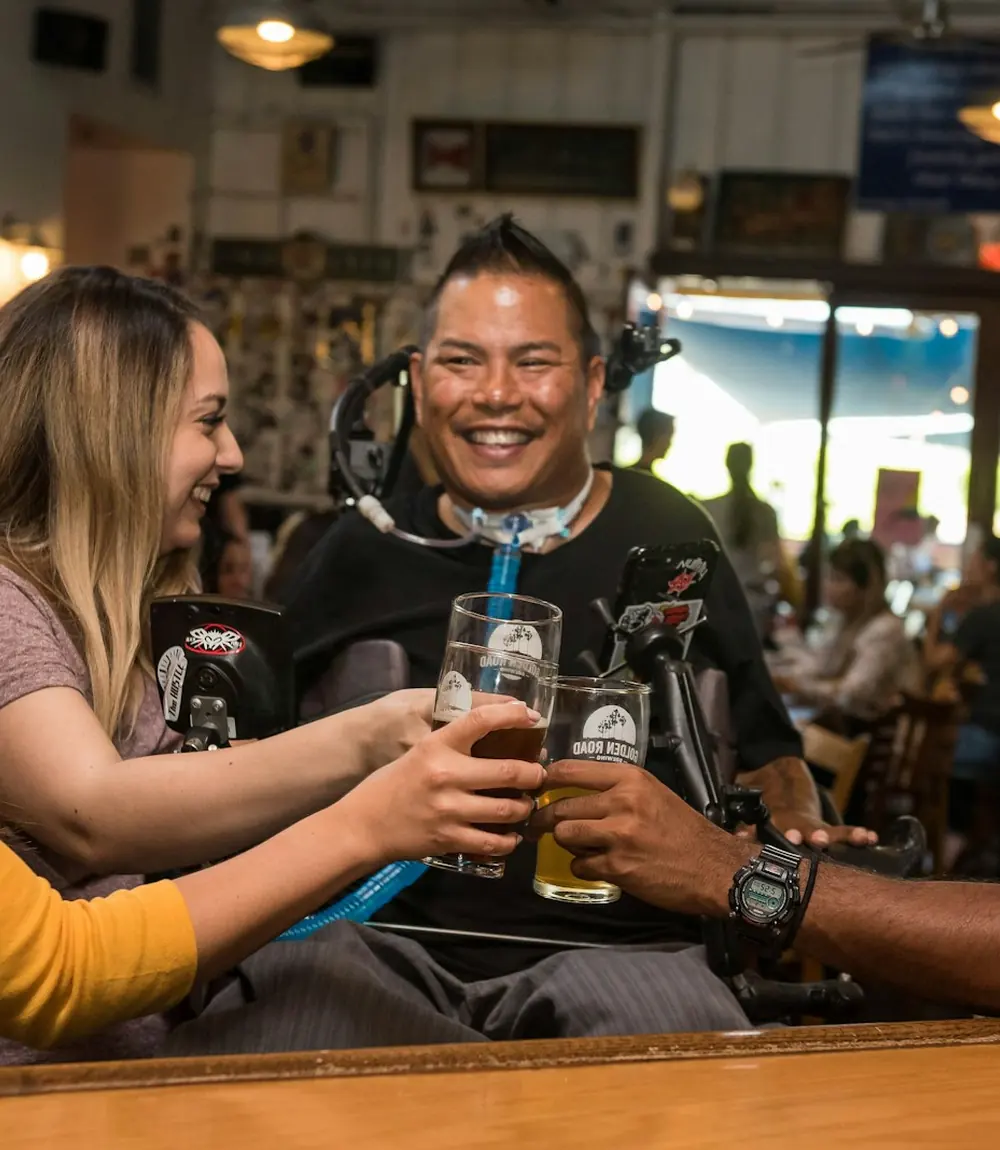 Friends raising a toast around a table